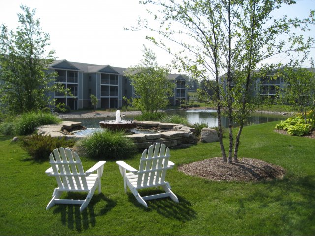 Image of Lush Landscaping with Water Features for Liv Arbors