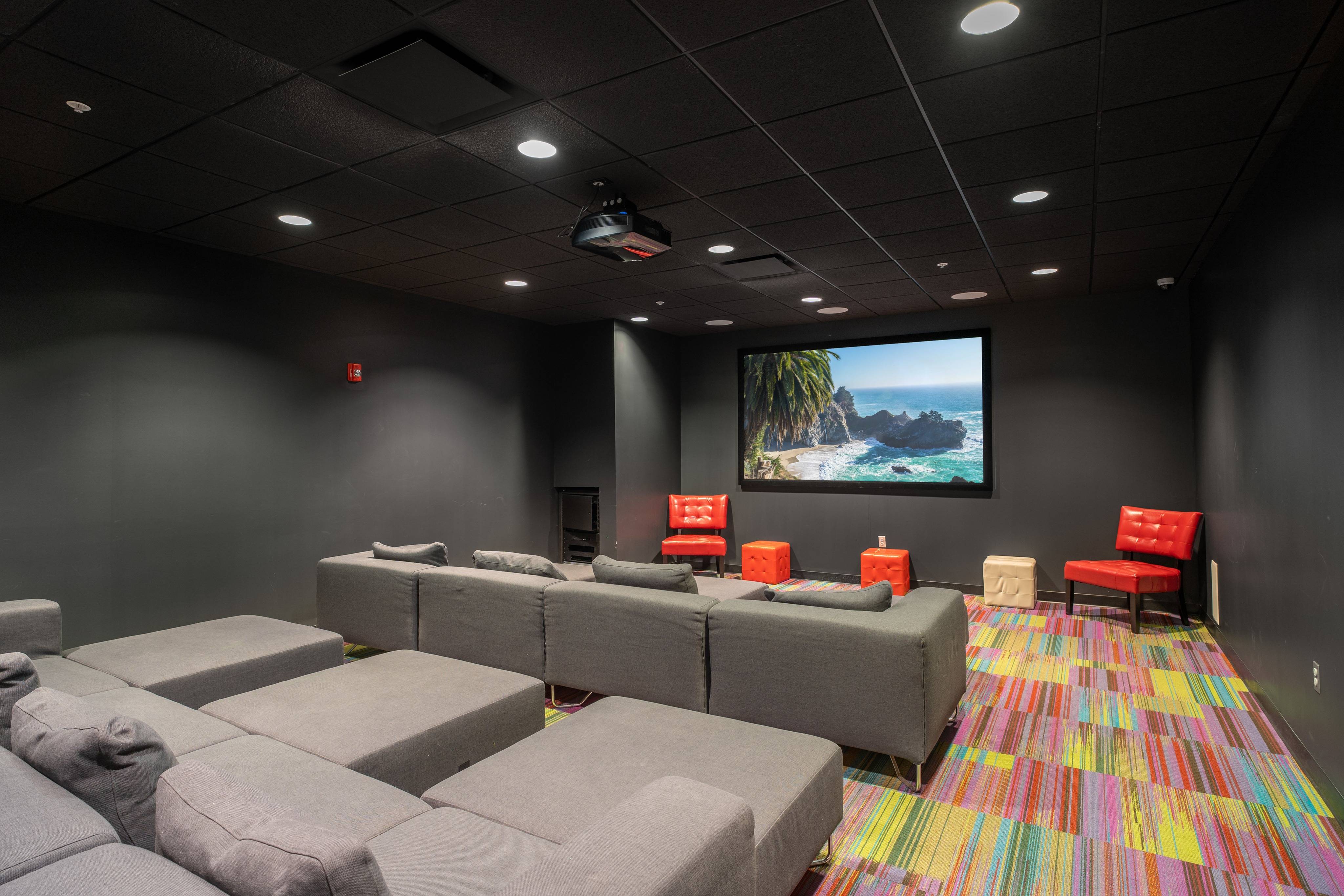 District Flats Apartments Lifestyle - Movie Theater