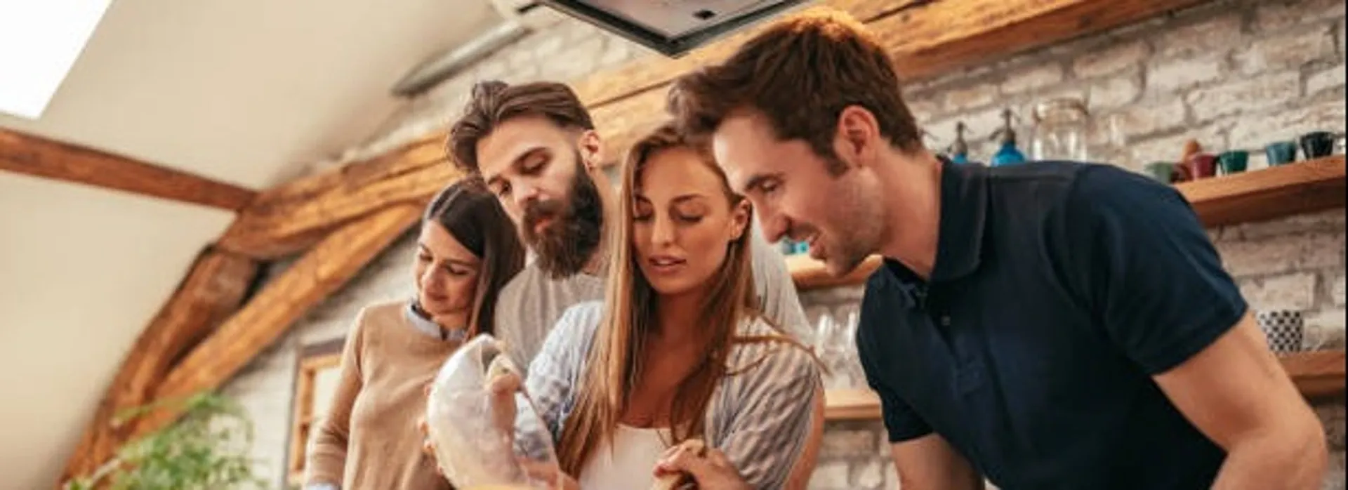 Friends cooking in kitchen