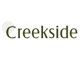 Elegant Creekside logo featuring wavy lines in a sophisticated green font.