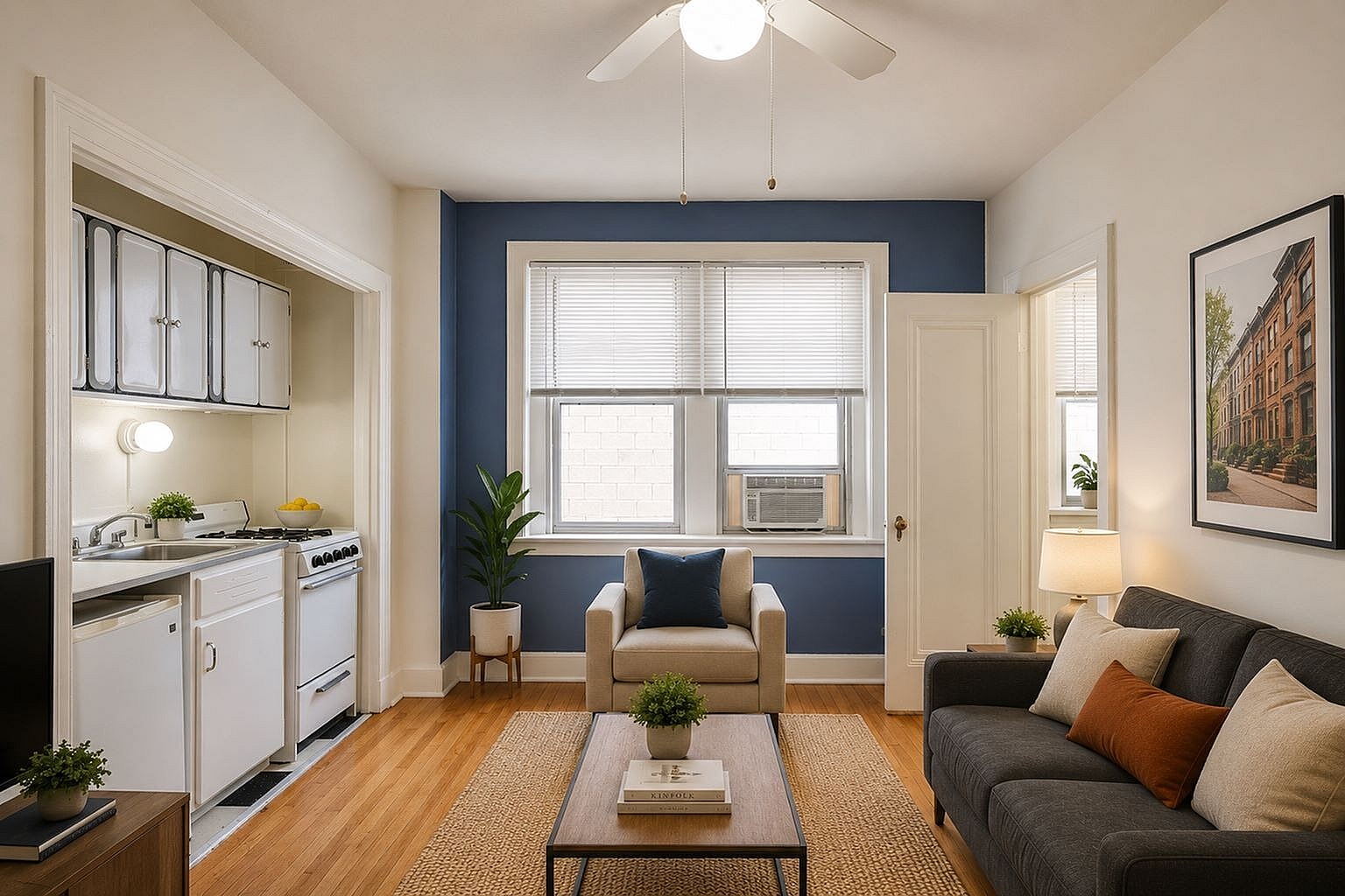 Charming living room with tasteful decor, highlighting a cozy sofa, elegant armchair, and a compact open kitchen. Natural light floods through large windows, enhancing the inviting atmosphere.