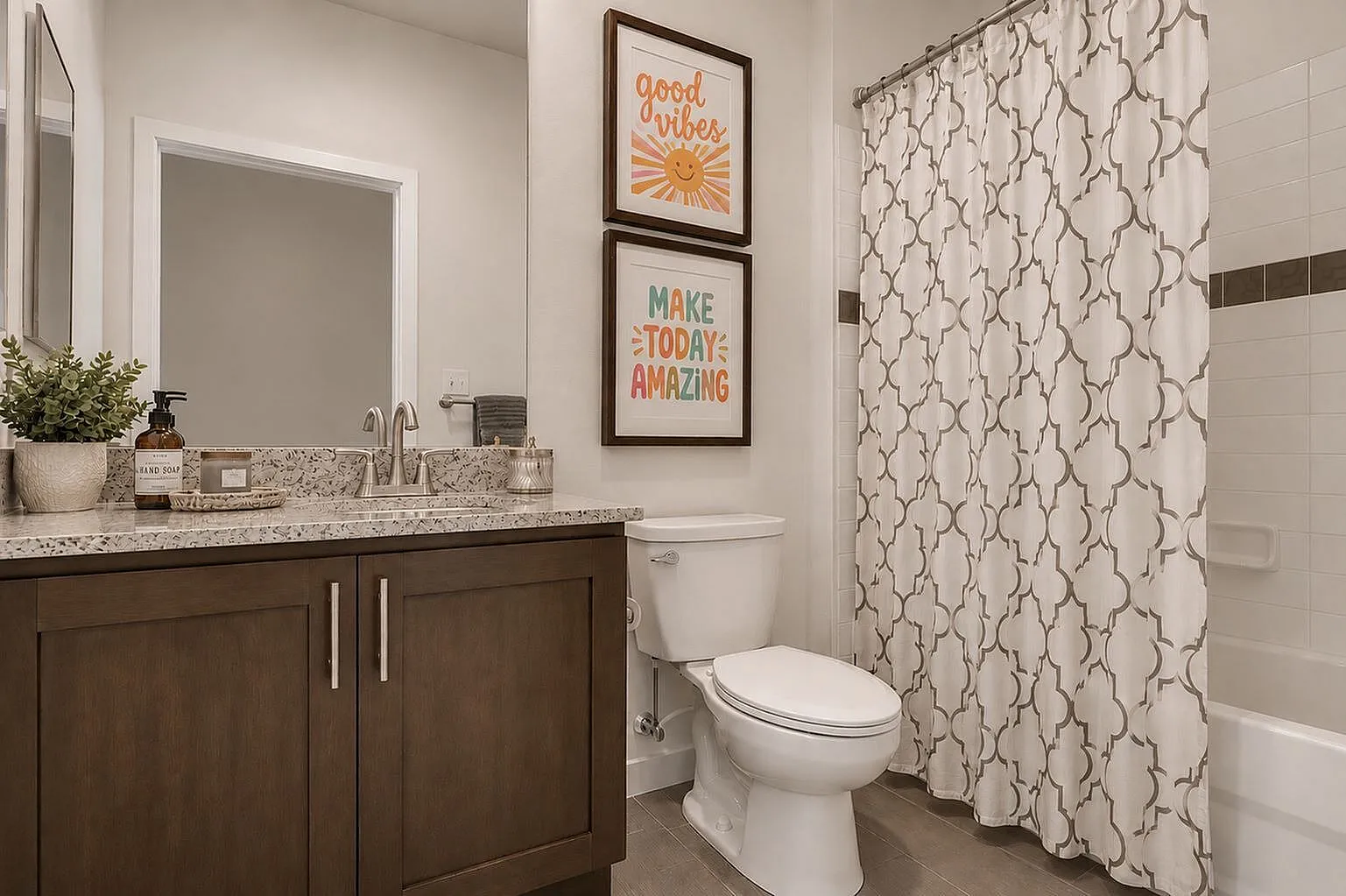 Elegant bathroom with modern vanity, chic decor, and inviting shower area, perfect for relaxation.