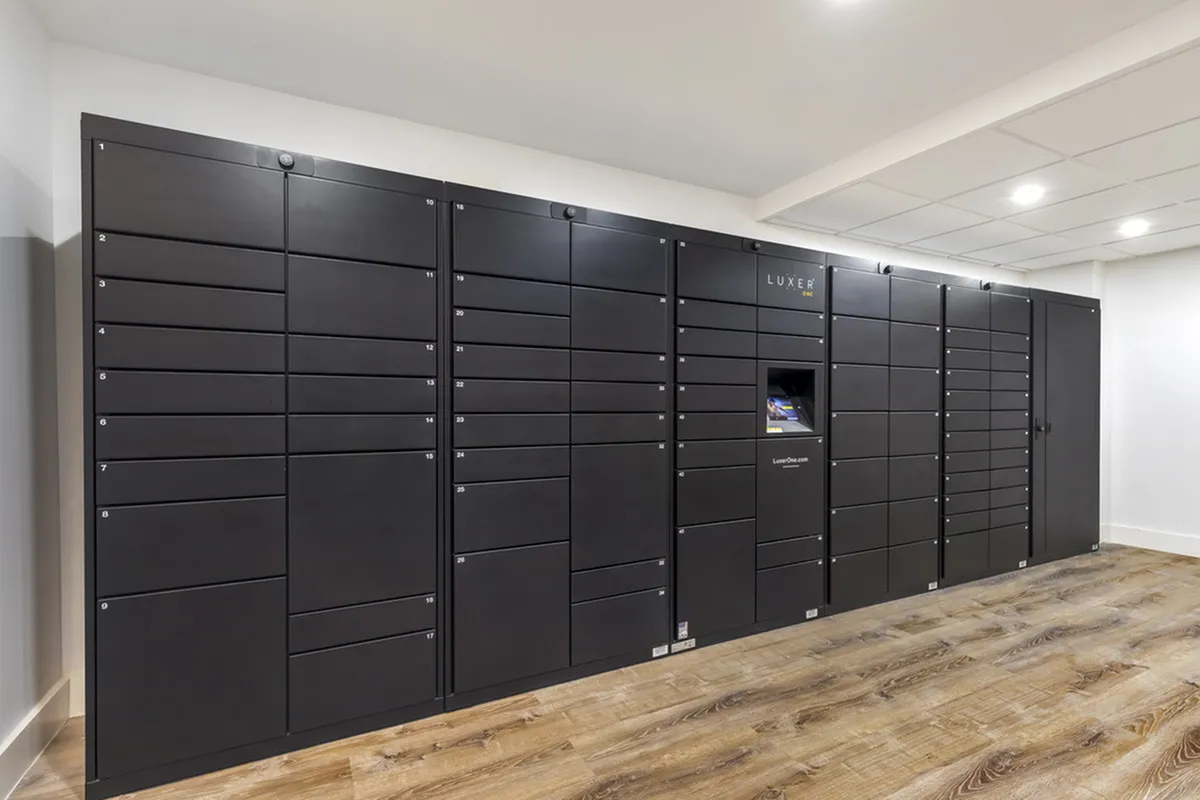 Luxer package locker system in modern apartment building