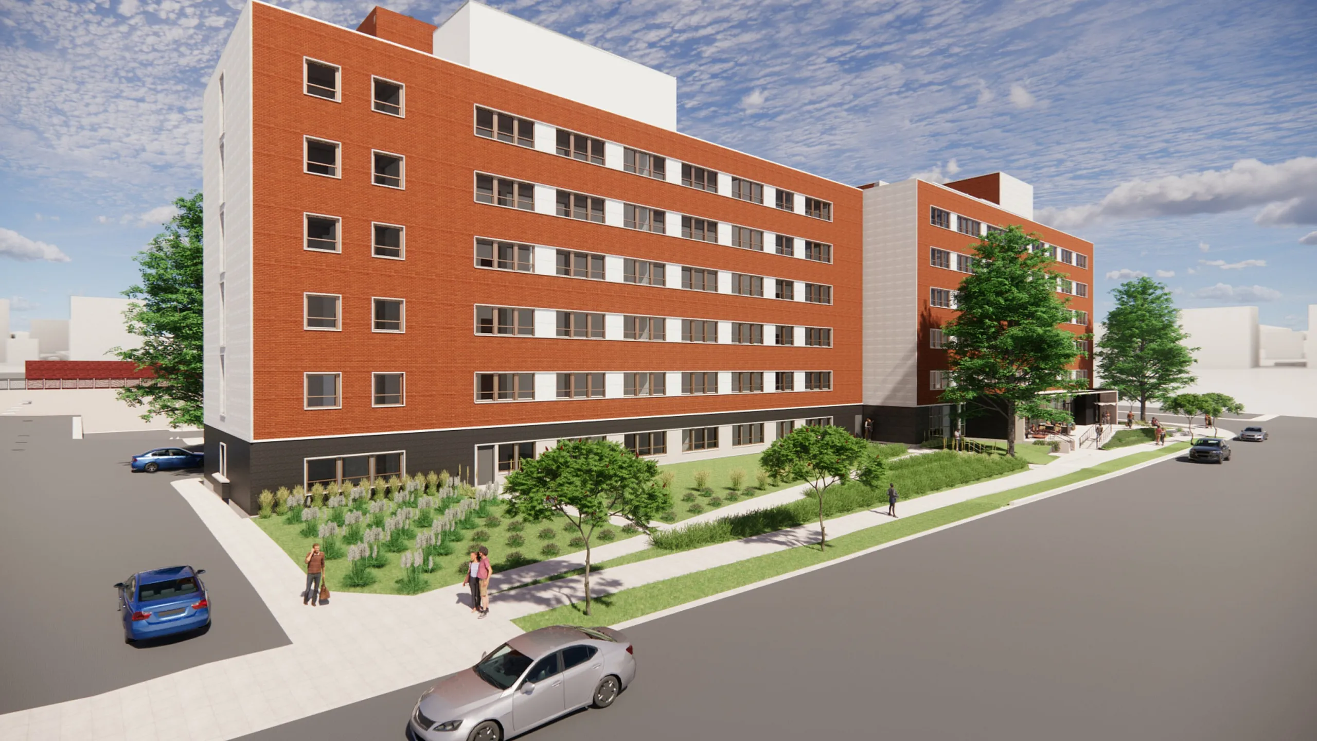 Contemporary apartment building with red brick facade, lush landscaping, and inviting street view.