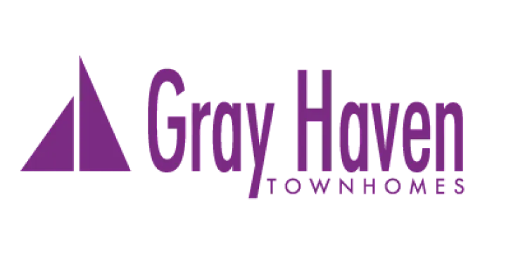 Gray Haven Townhomes logo with a modern purple triangle design, symbolizing elegance and stylish living.