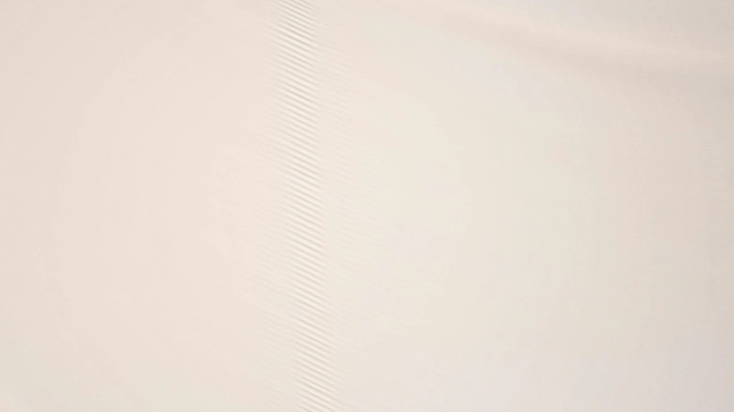 Minimalist abstract background with soft beige tones and gentle curved lines, perfect for elegant design projects.