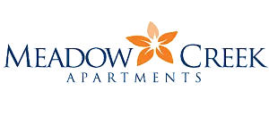Elegant Meadow Creek Apartments logo featuring a stylized orange flower symbolizing vibrant and welcoming living spaces.