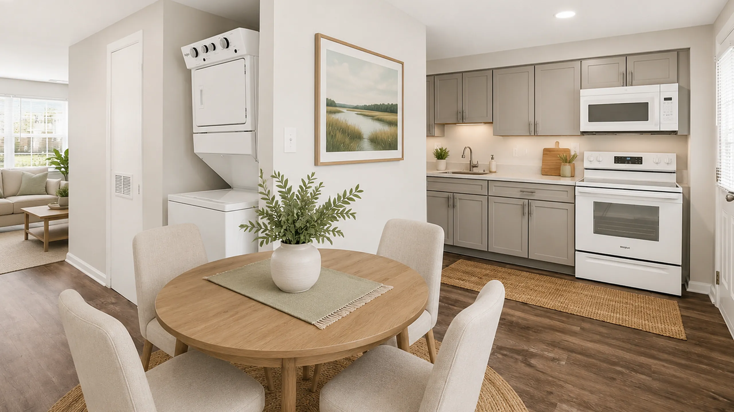 Charming open-plan kitchen and dining area with modern appliances, stylish cabinetry, and cozy seating, perfect for comfortable living.