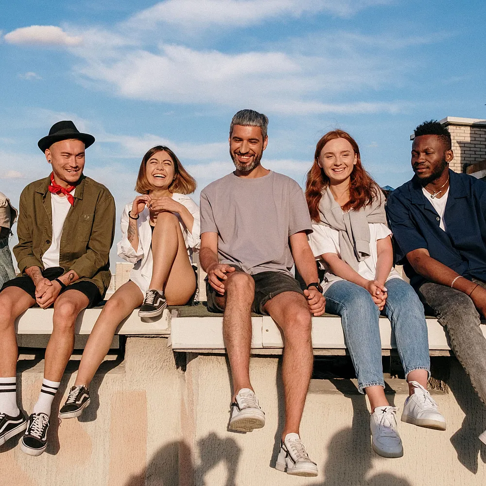 group of people on a bench