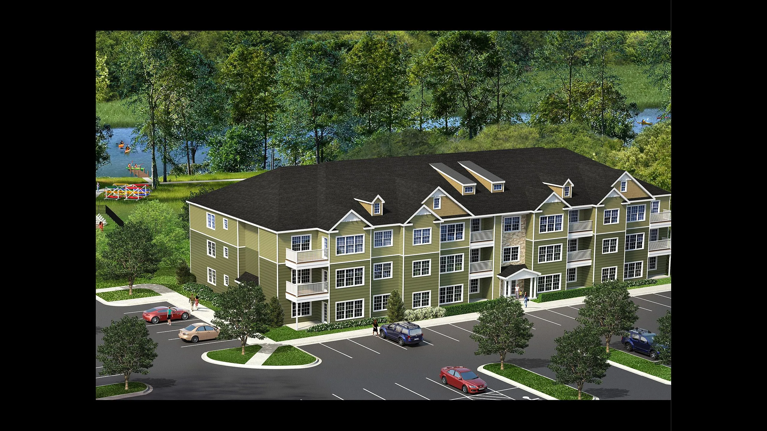 Aerial view of the Mohawk Riverfront Apartments community beside the Mohawk River in Cohoes, NY