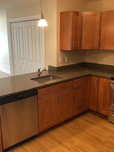 Apartment kitchen with full-size appliances at Mohawk Riverfront Apartments in Cohoes, NY