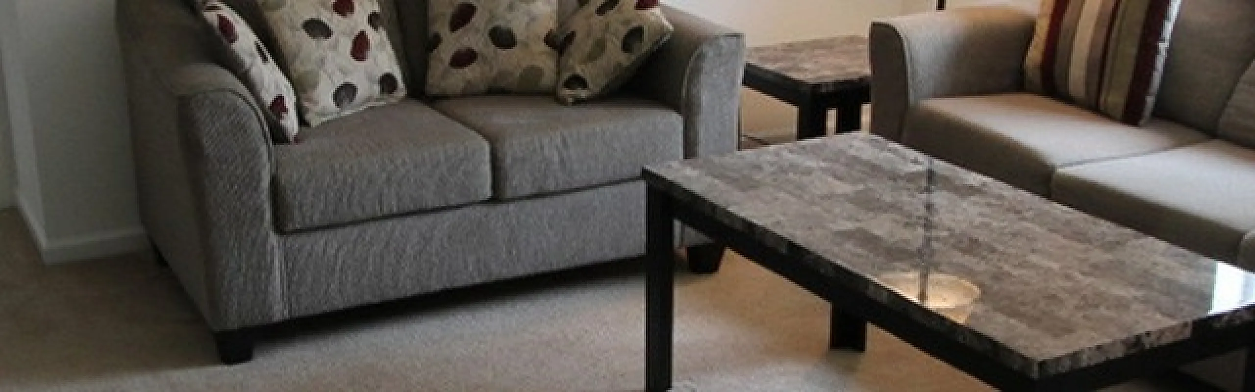 Spacious living room at Long Pond Village Apartments in Schenectady, NY