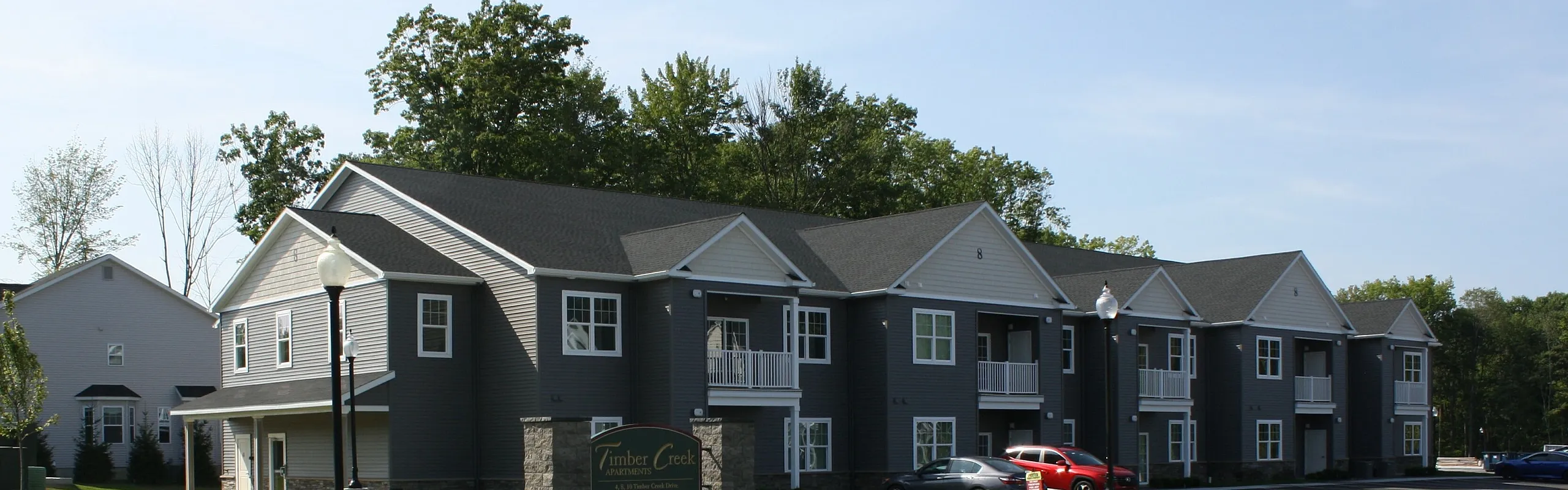Apartment building exterior at Timber Creek Apartments in Ballston Lake, NY