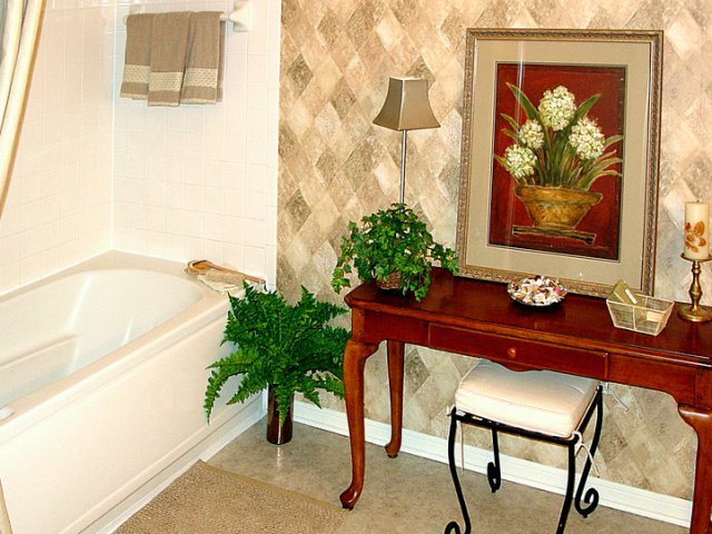 Image of Master bath with relaxing six-foot garden tub for Maison Bocage Apartments
