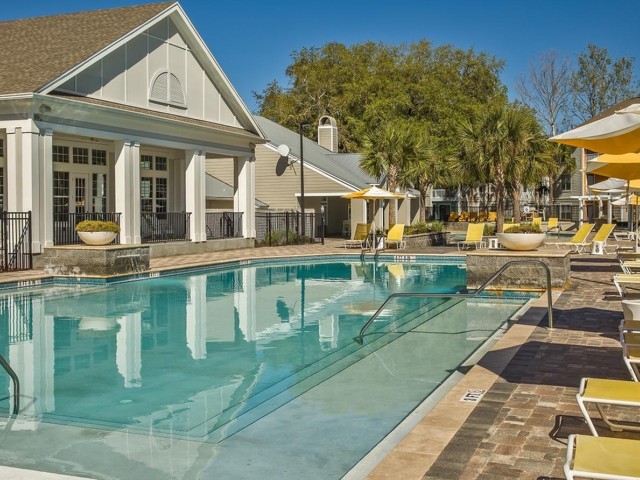 The Glenn-Exterior | Sparkling Swimming Pool with deck chairs