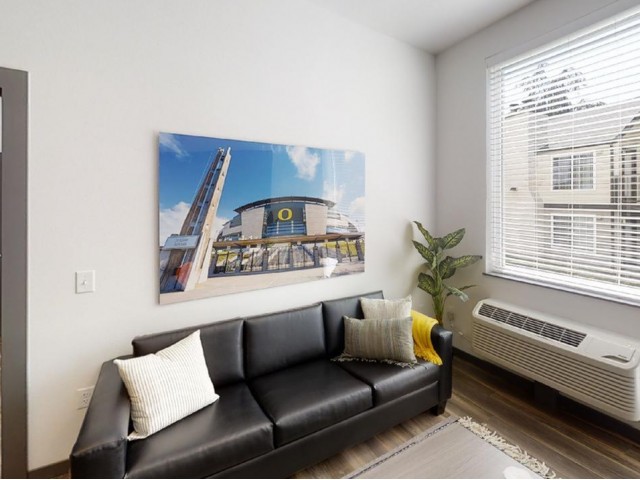 Bright Apartment Living Room at The Flats at Chase Student Apartments in Eugene, OR