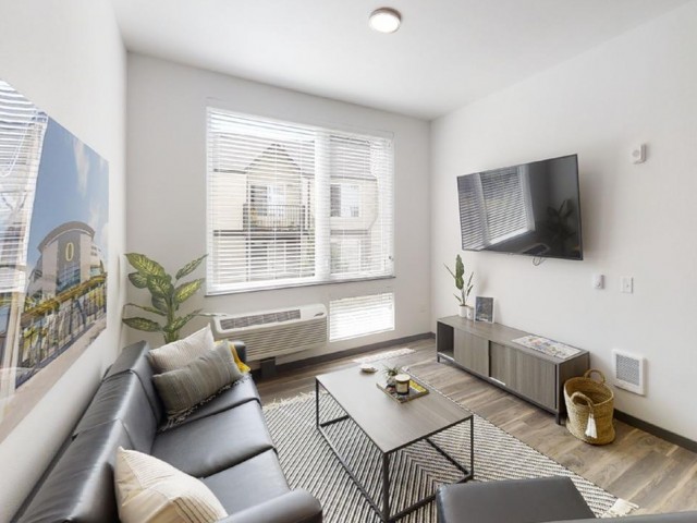 Spacious Apartment Living Room Interior at The Flats at Chase Student Apartments in Eugene, OR
