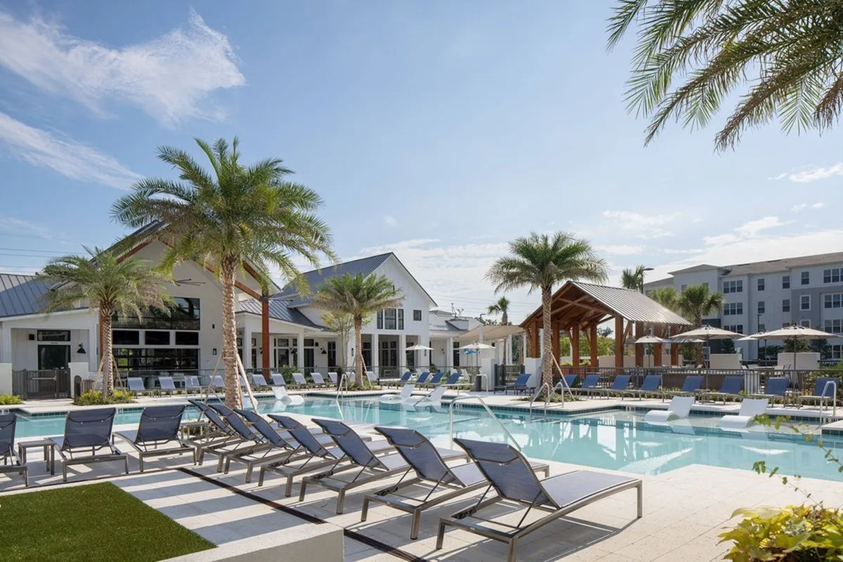 Campus Circle Gainesville saltwater swimming pool with sundeck and lounge seating for students in Gainesville Florida