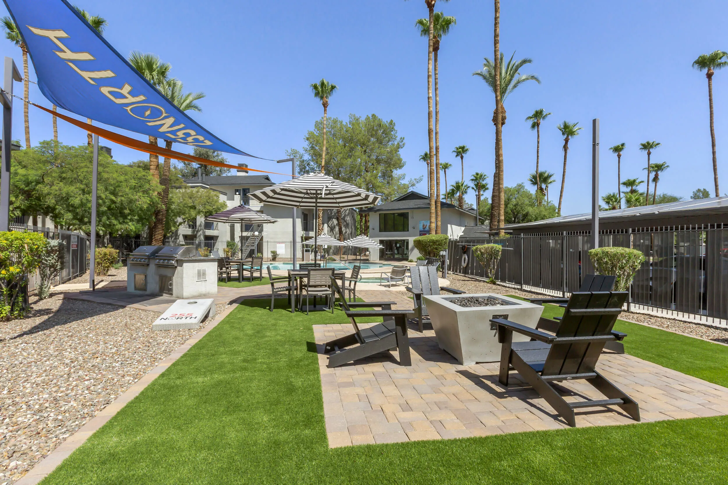 255 North beautifully manicured landscaping with lush greenery and mature trees throughout Tucson AZ community
