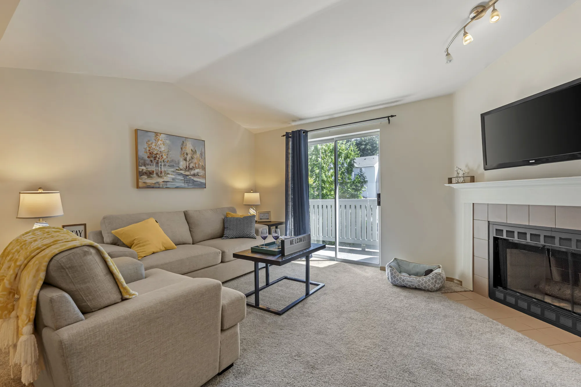 Wood-burning fireplace in apartment home at Canyon Springs in Lynnwood, WA