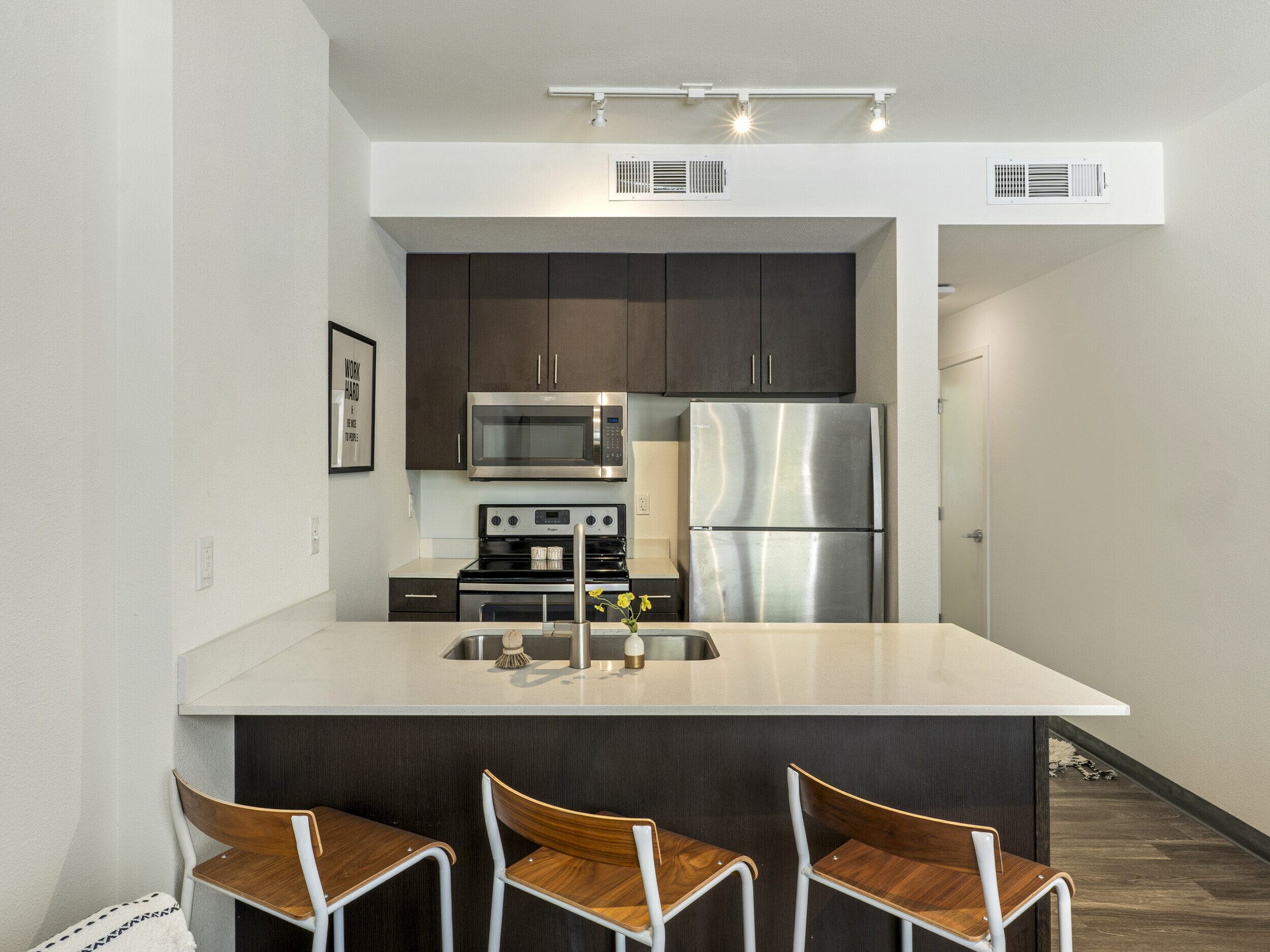 Republic on Main apartment living room and kitchen with quartz countertops in Moscow, ID