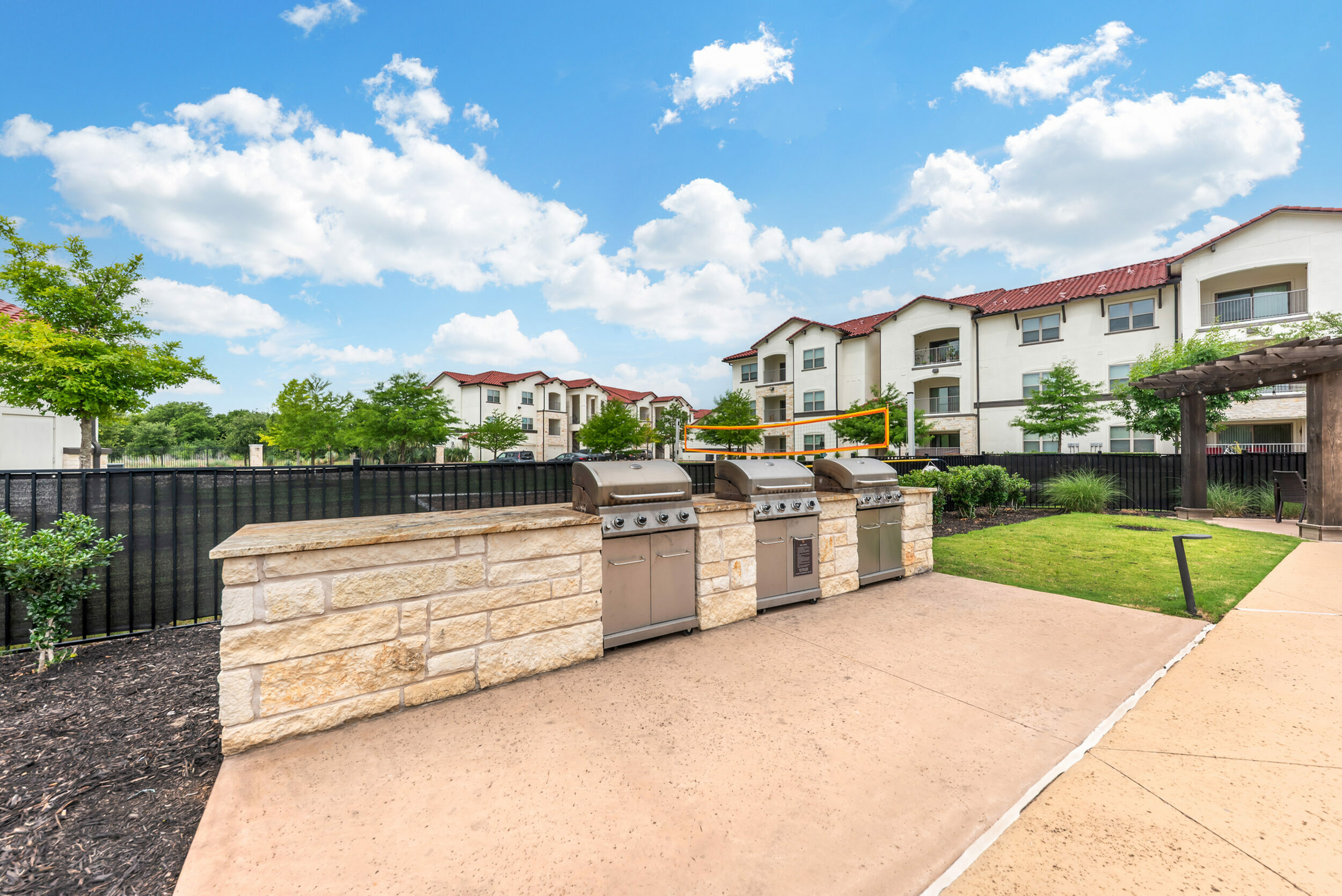 Outdoor Grilling Island at Stone Hill Apartments in Pflugerville, TX