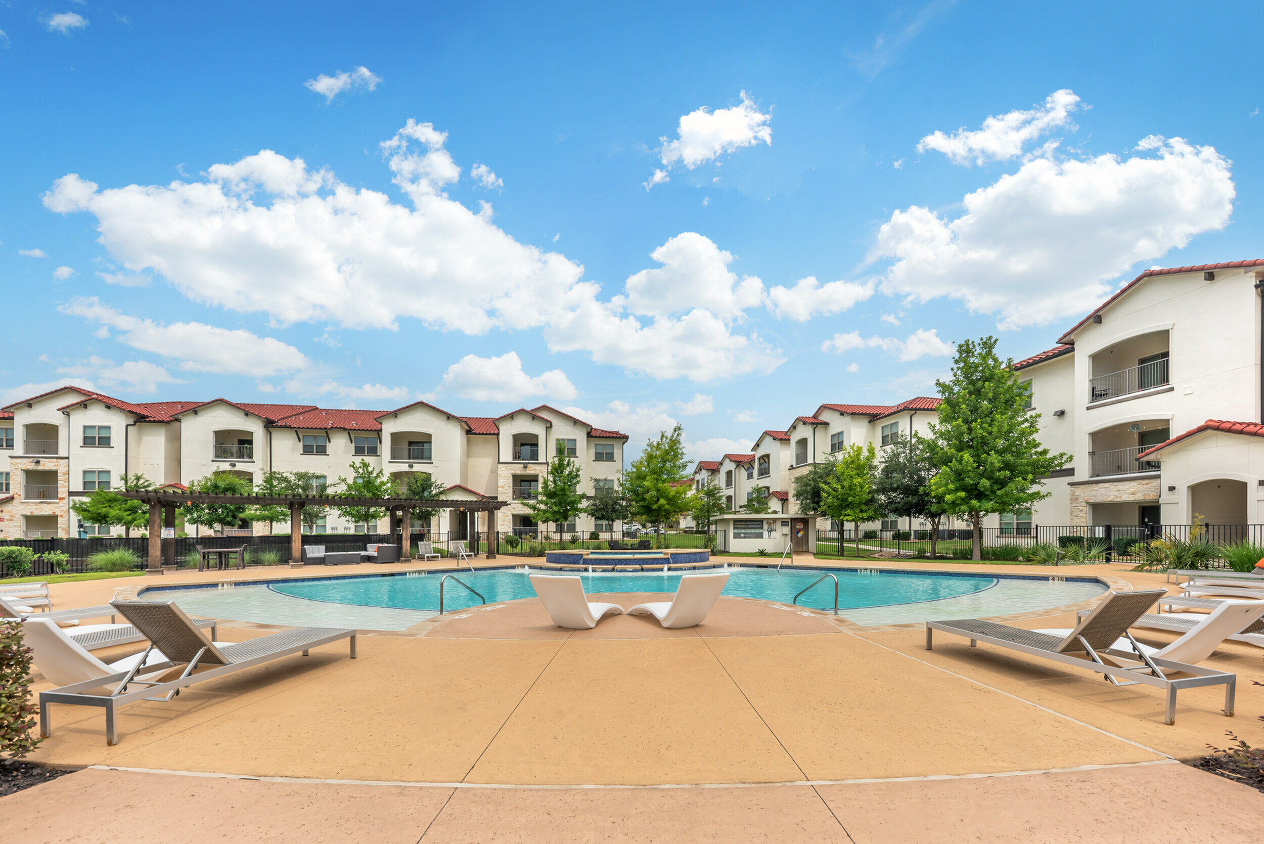 Resort-Style Swimming Pool at Stone Hill Apartments in Pflugerville, TX