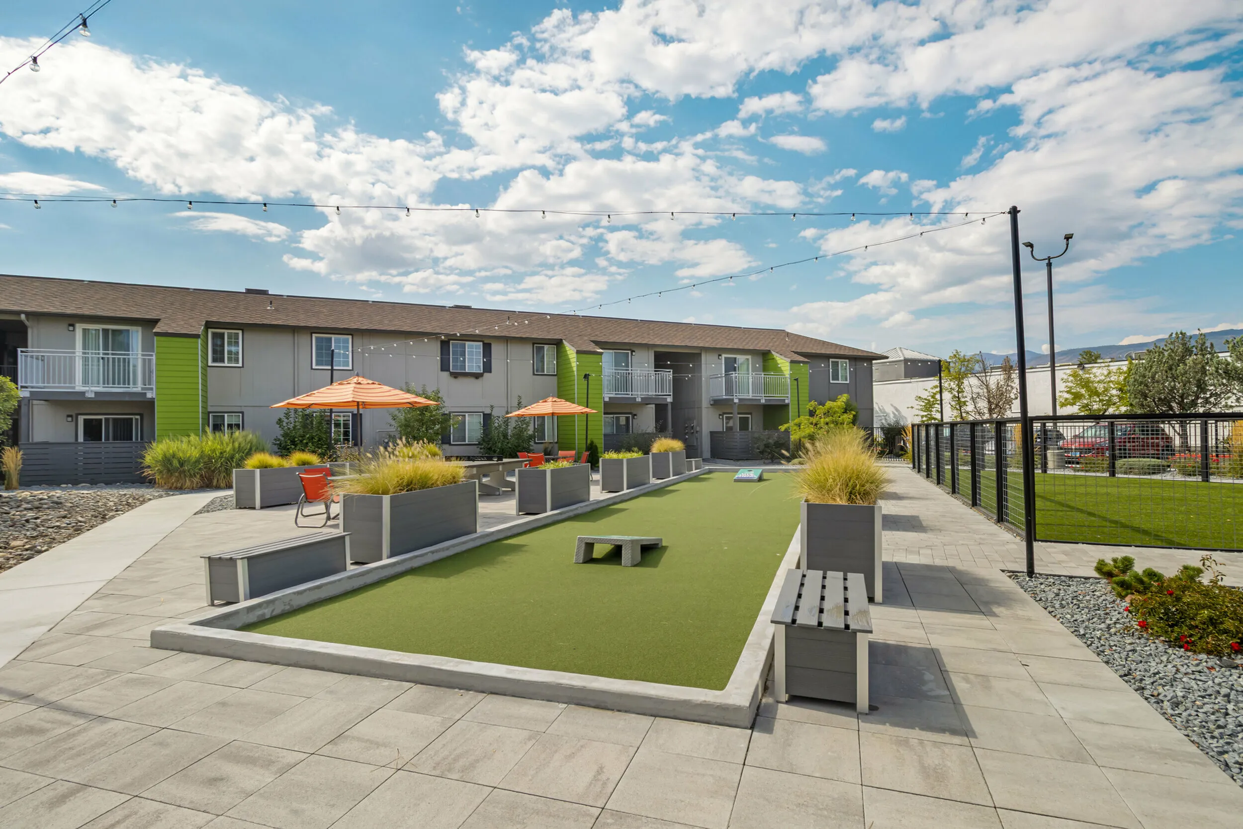 The Phoenix Reno outdoor cornhole game area for residents in Reno NV