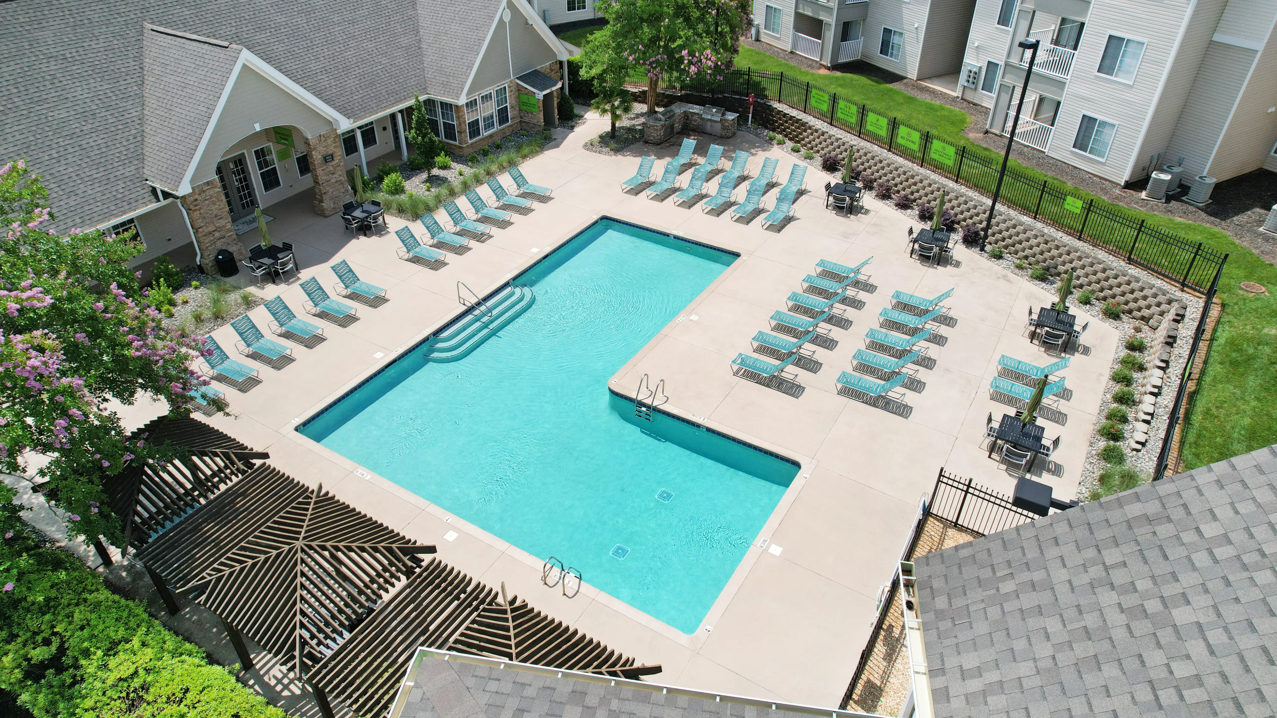 Resort-style 5-foot deep swimming pool at Village Green student apartments near NC State in Raleigh NC