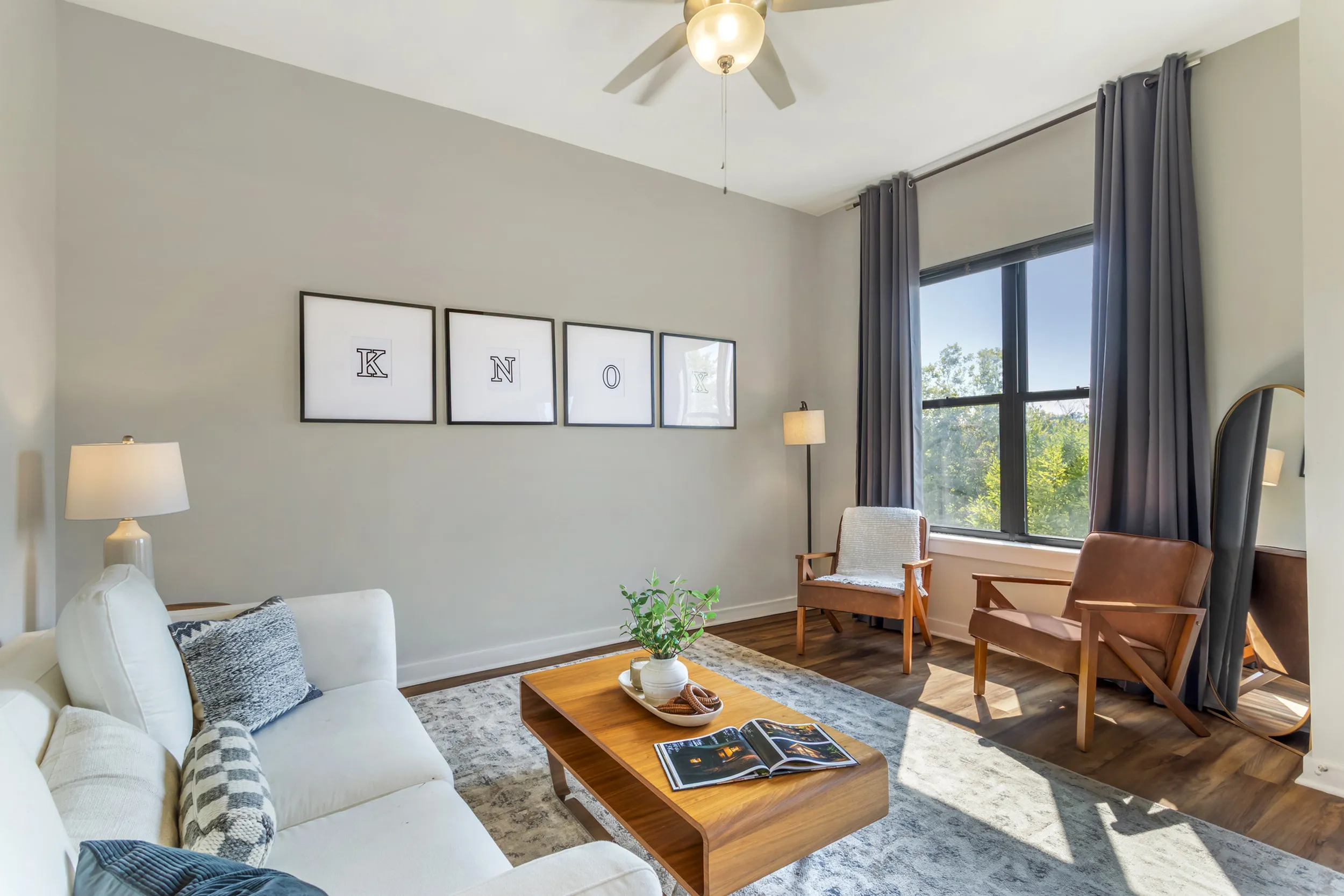 Spacious apartment interior featuring hardwood-style flooring at The Landings riverside living Knoxville TN