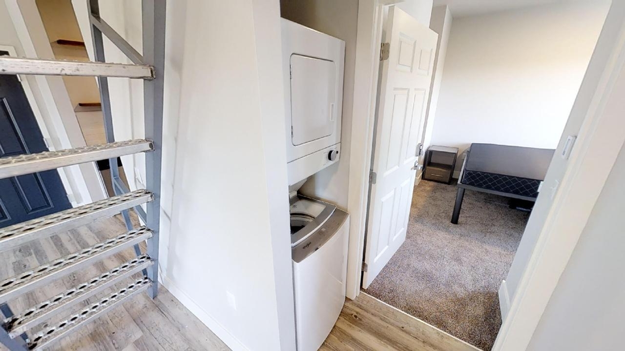 In-unit full-size washer and dryer in a 3-bedroom loft at The 446 student housing near WSU in Pullman WA