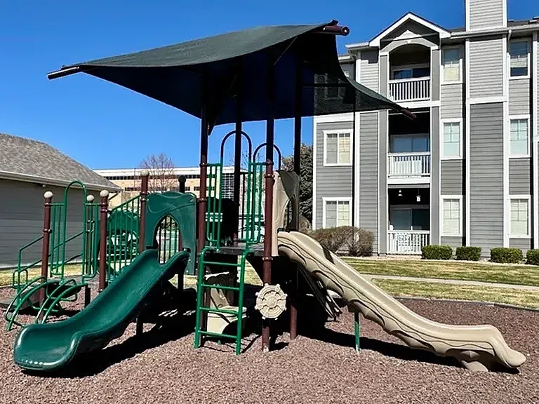 Playground at Pinnacle Mountain View apartments in Clearfield, UT