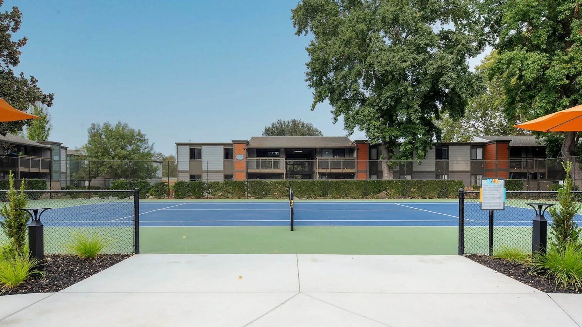 Tennis court amenity at Apex on the River apartments in Sacramento, CA