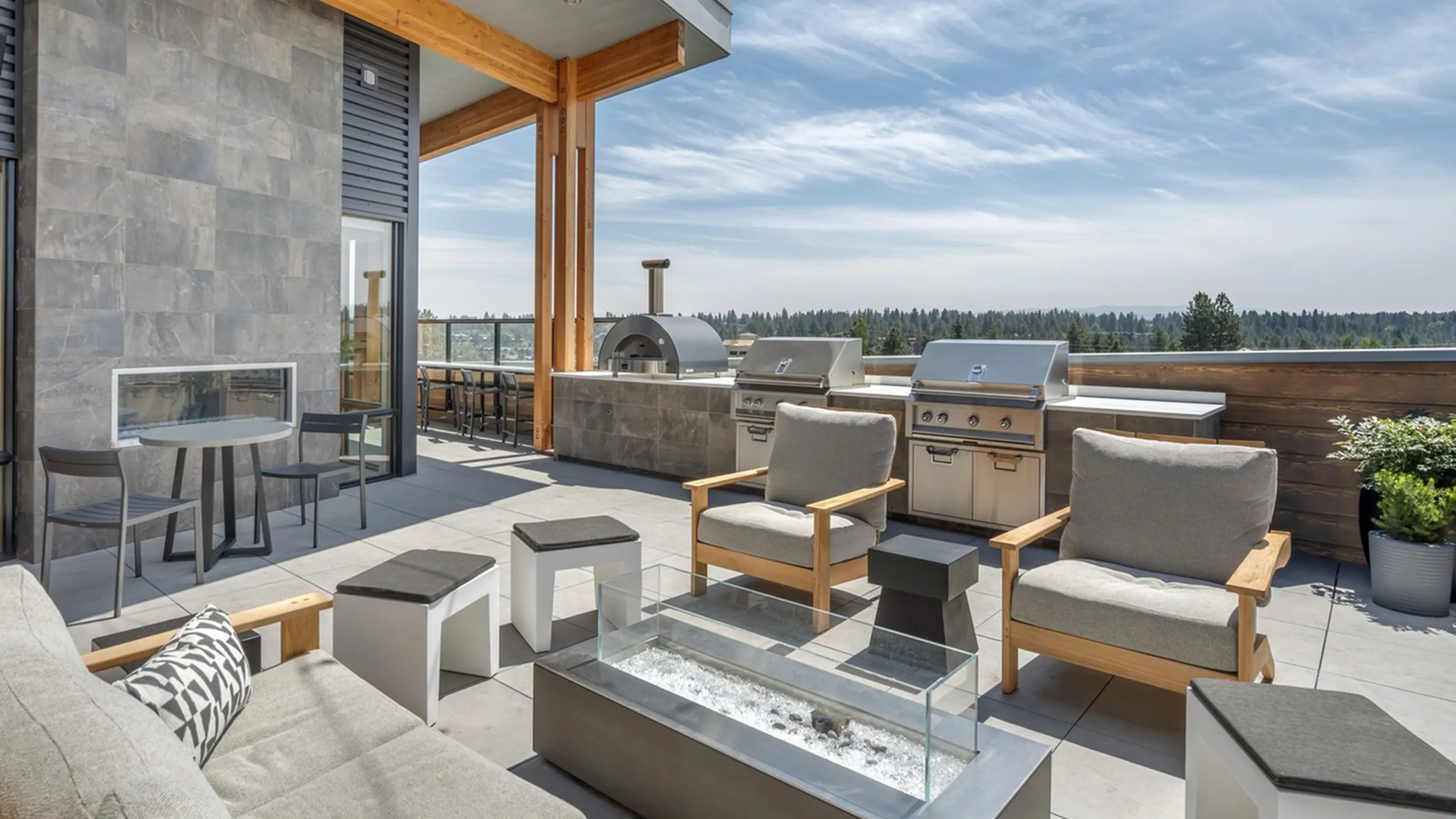 Rooftop lounge with outdoor seating at The Current LEED Gold certified apartments in Bend, OR