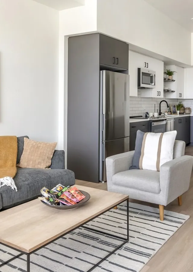 Open-concept living room at The Current luxury apartments in Bend, OR near the Cascade Mountains