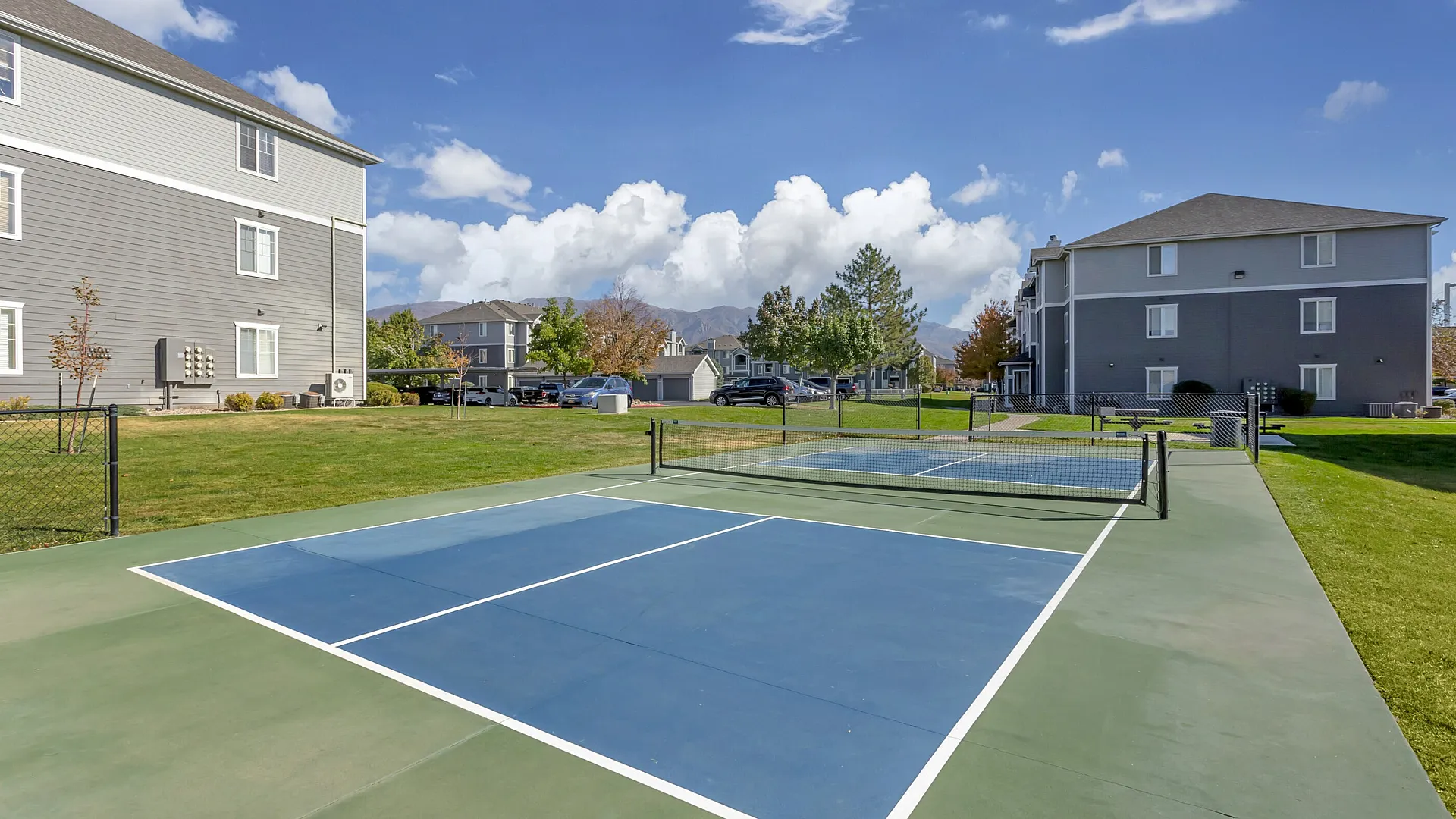 Pickleball and sport court at Pinnacle Mountain View apartments in Clearfield UT