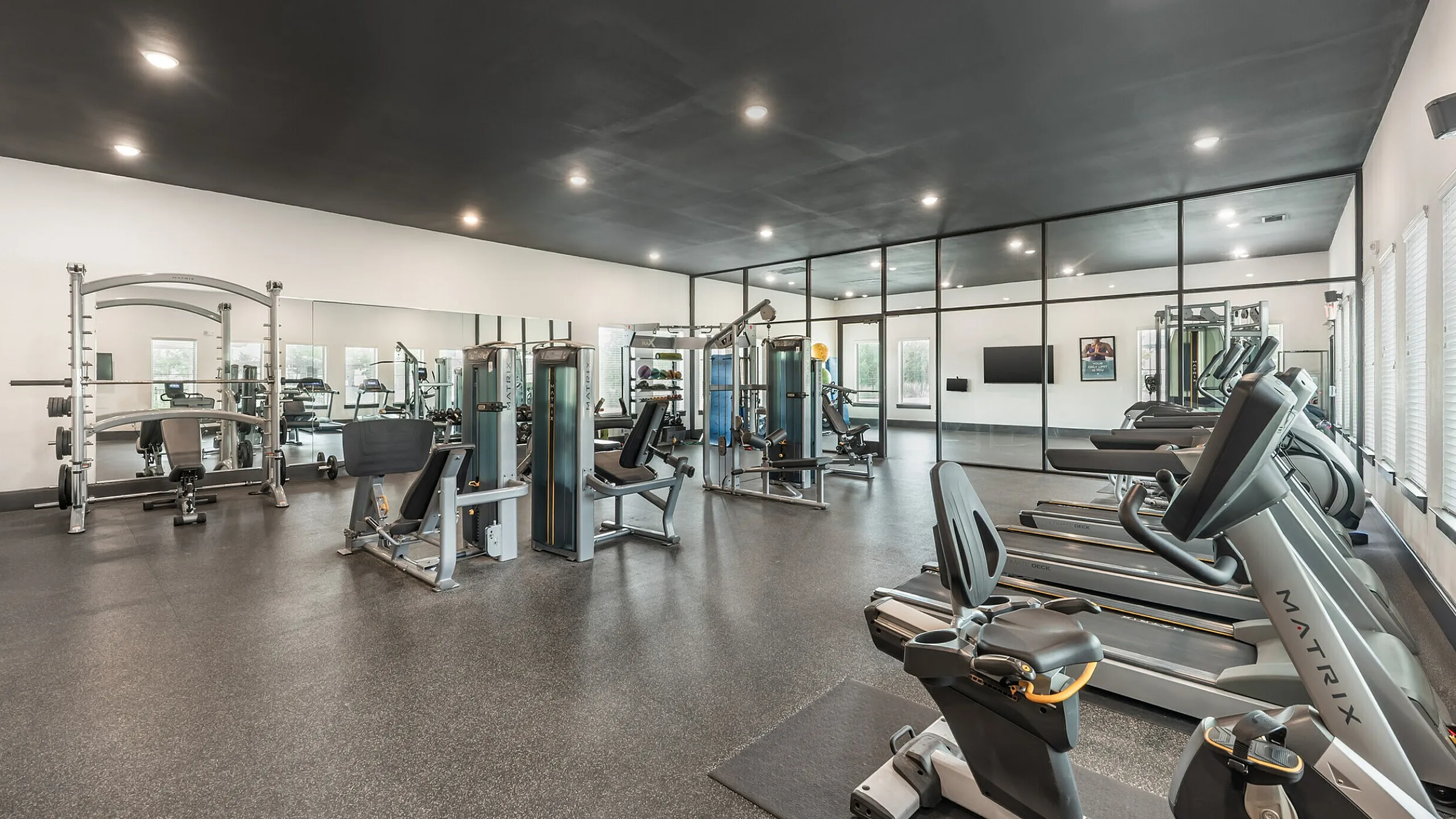 Spacious fitness center with state-of-the-art equipment at Stone Hill Apartments in Pflugerville, TX