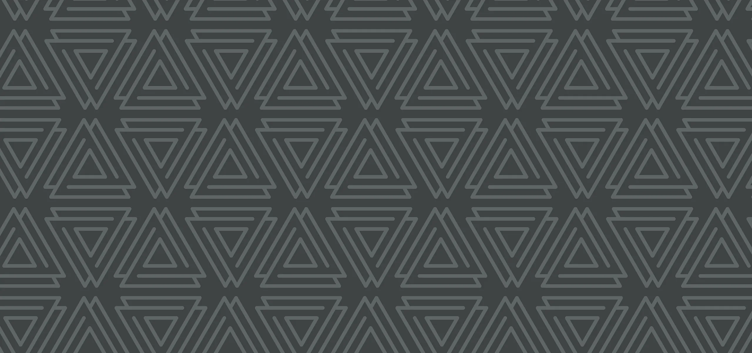Geometric triangle design element used on The View at Cedar Park luxury apartments website