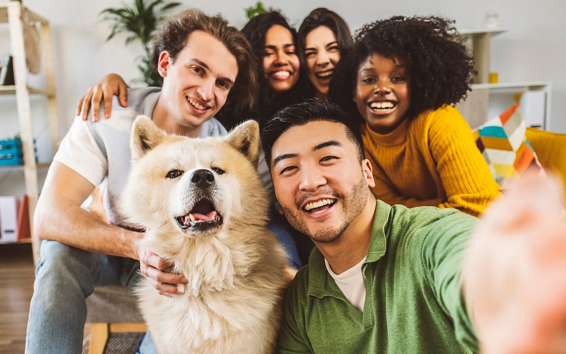 Pet-friendly community at The View at Cedar Park apartments in Cedar Park, TX - friends with dog in modern apartment