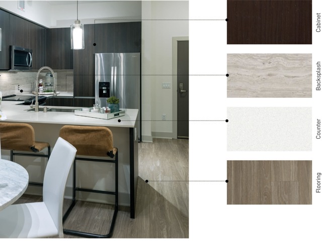 Material swatches next to an image of a kitchen with warm, dark finishes: dark brown wood cabinets, striated beige stone backsplash, light brown wood-style floors, and shiny ivory quartz counters.