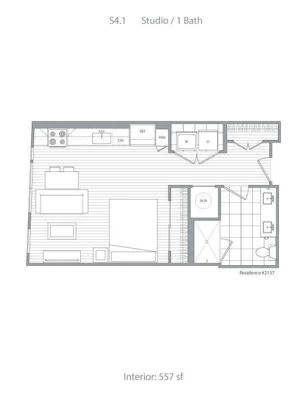 Chic studio layout featuring an open living space, modern kitchen, and well-appointed bathroom, encompassing 557 sq ft.
