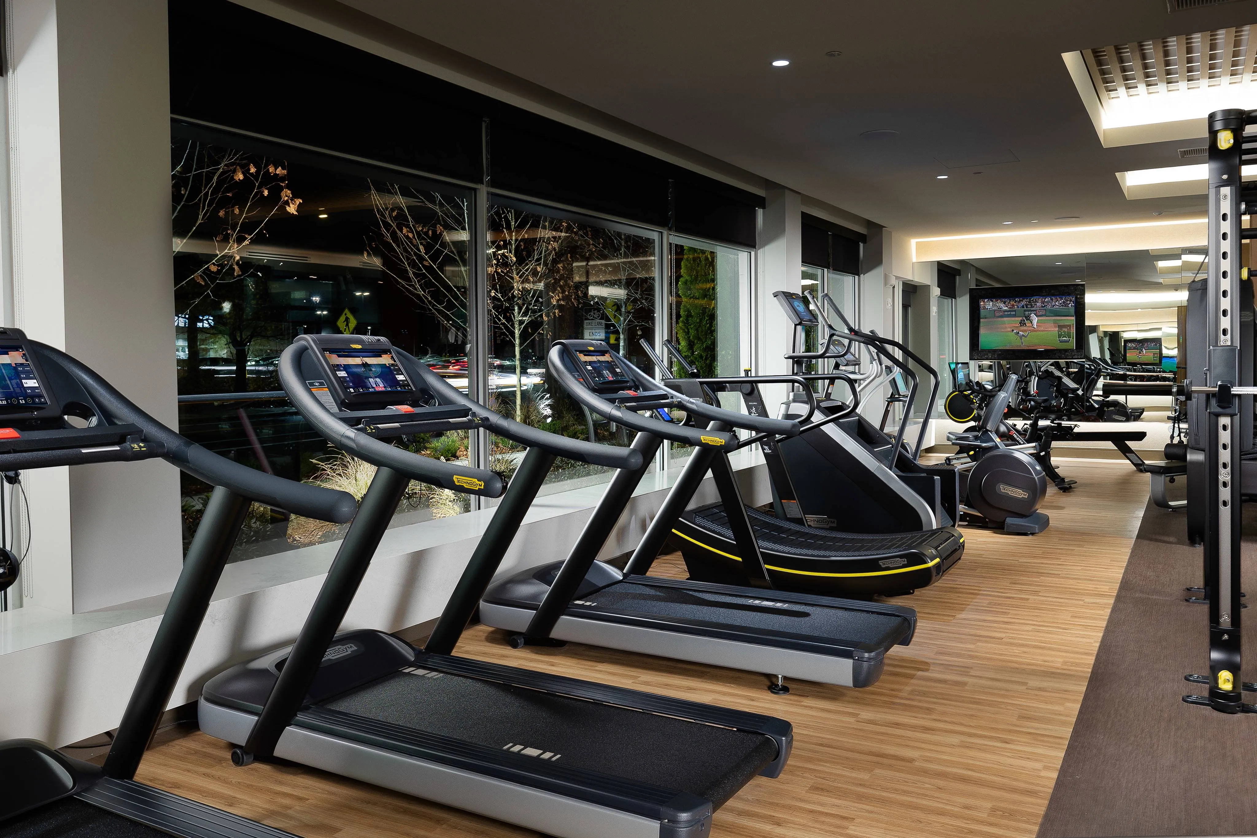24-hour state-of-the-art fitness center featuring Echelon on demand spin bikes and Reflect mirror