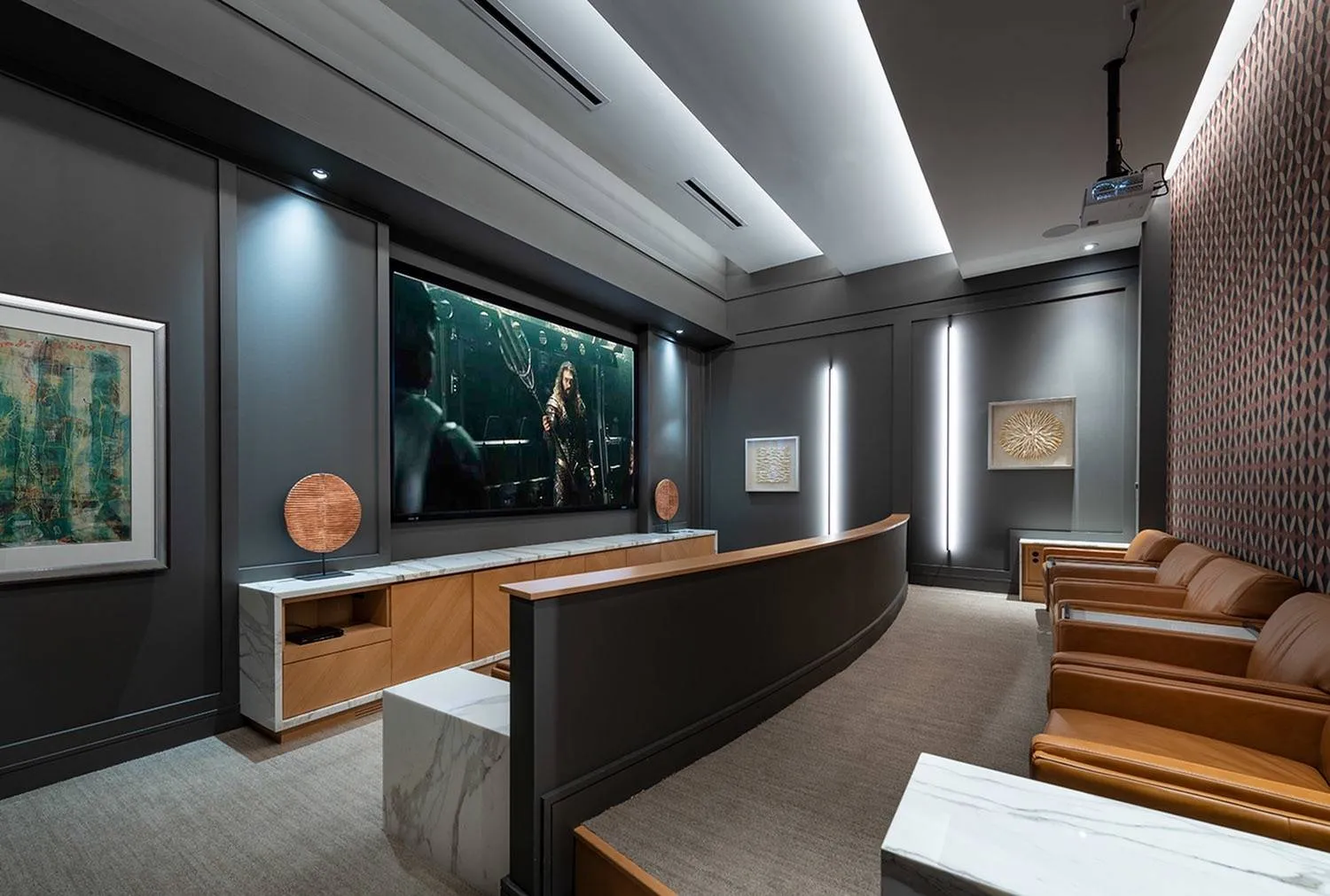 Private media room with projector, surround-sound and stadium-style seating