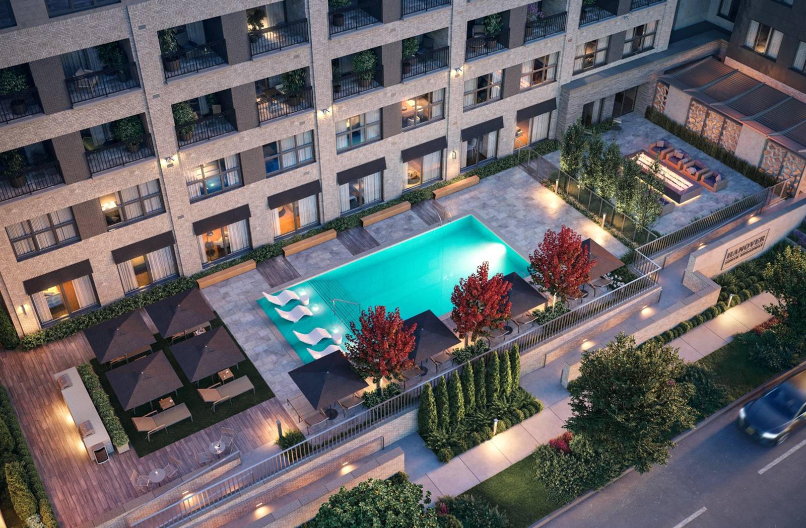 Resort-style pool with Sunbrellas and in-pool chaises