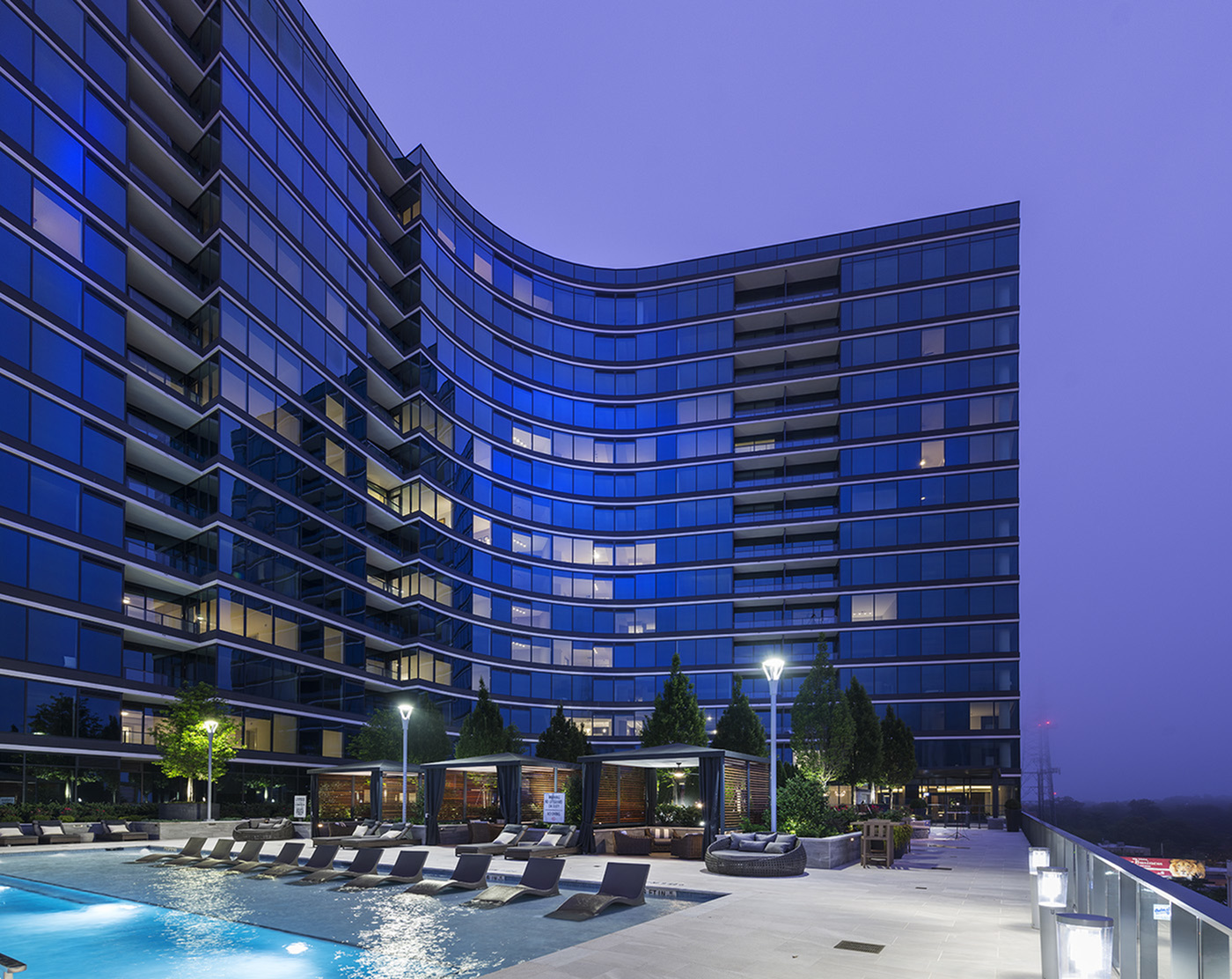 Resort-style pool with private pool-side cabanas and fireplace