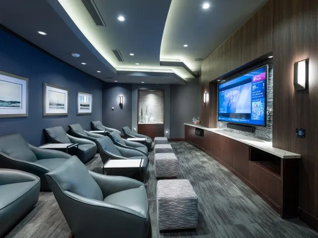 Private Media Room Featuring Surround-Sound and Theater-Style Seating