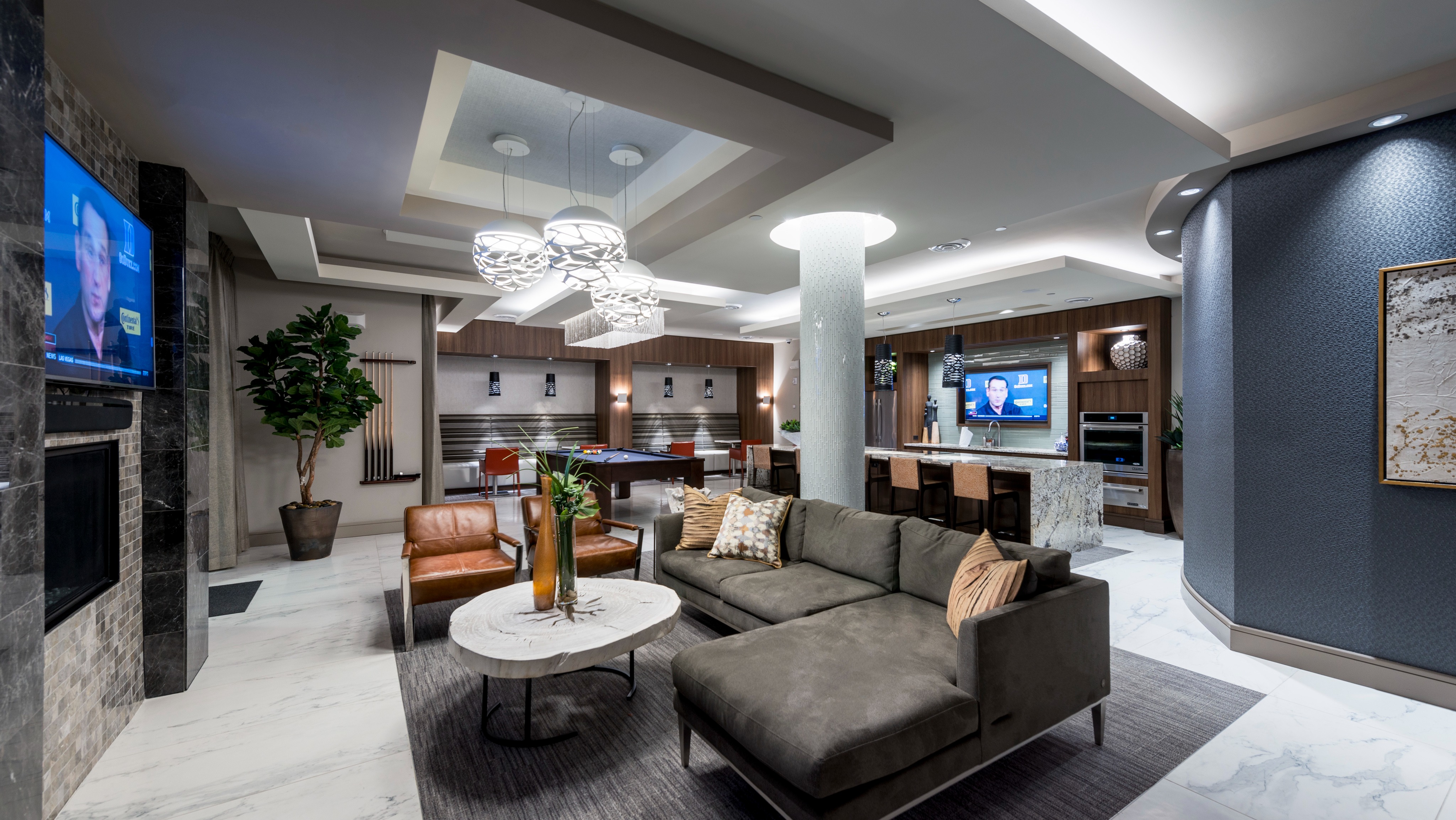 Entertaining kitchen and social lounge and banquet seating