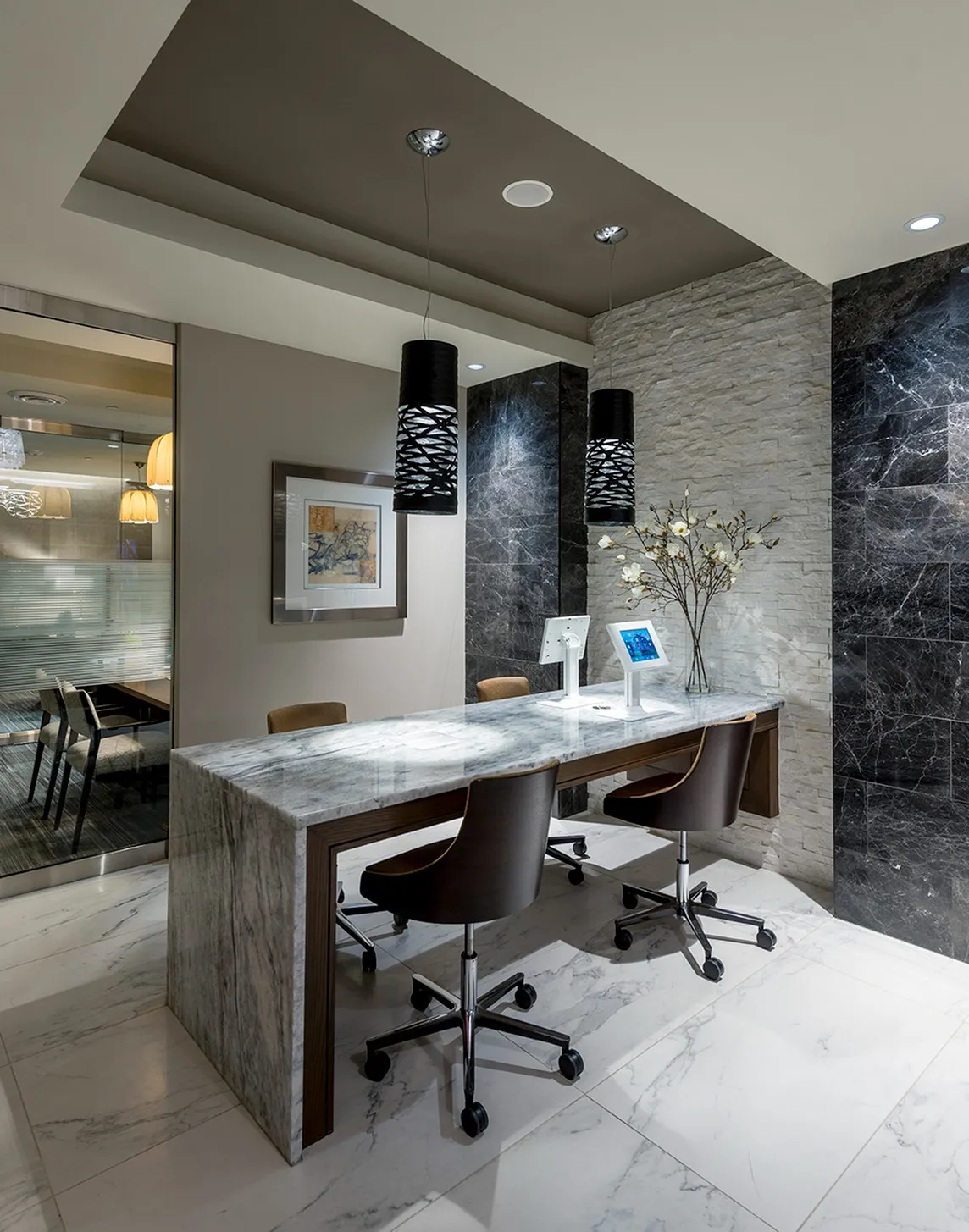 Ample coworking space with private meeting rooms, banquette seating, iPad stations, Wi-Fi and USB connectivity