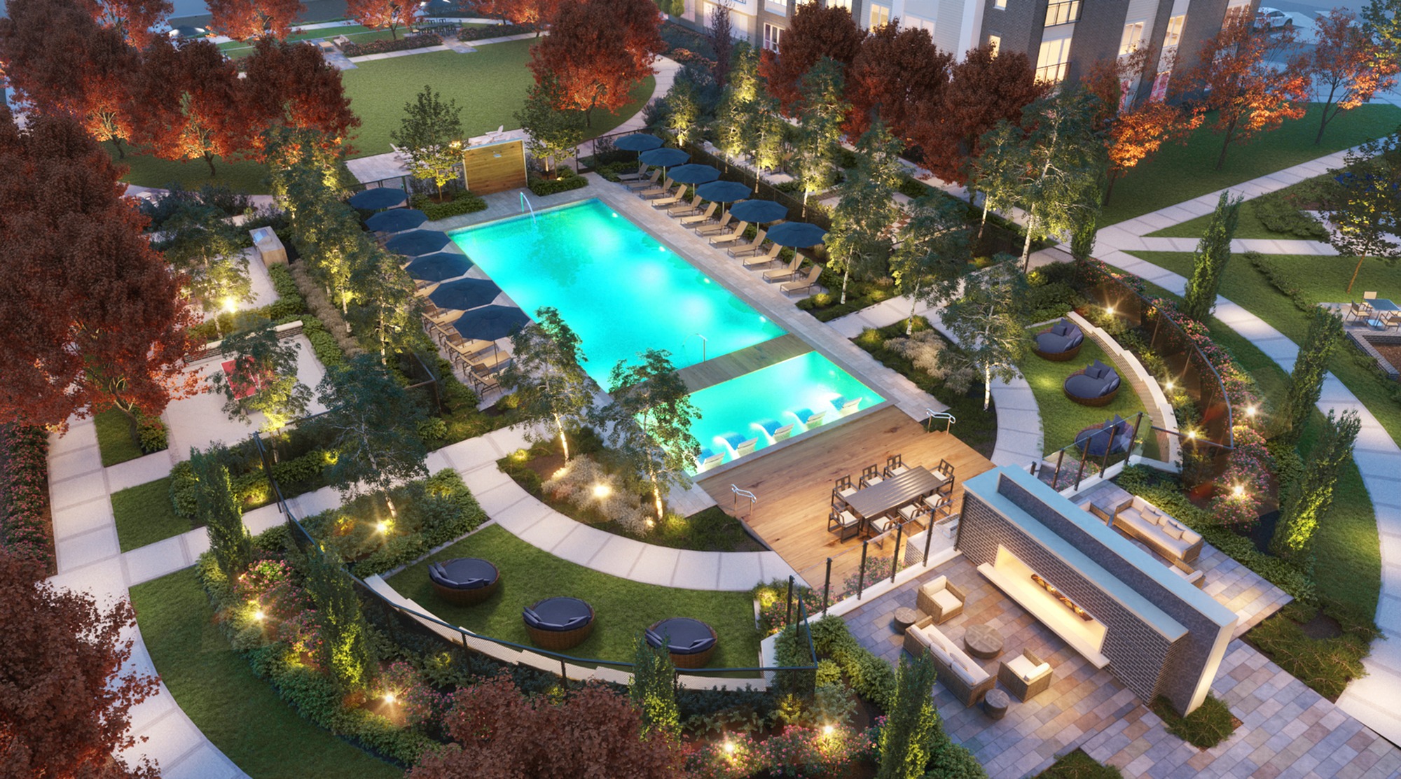 Sun-splashed pool with a collection of lounges and shaded seating areas