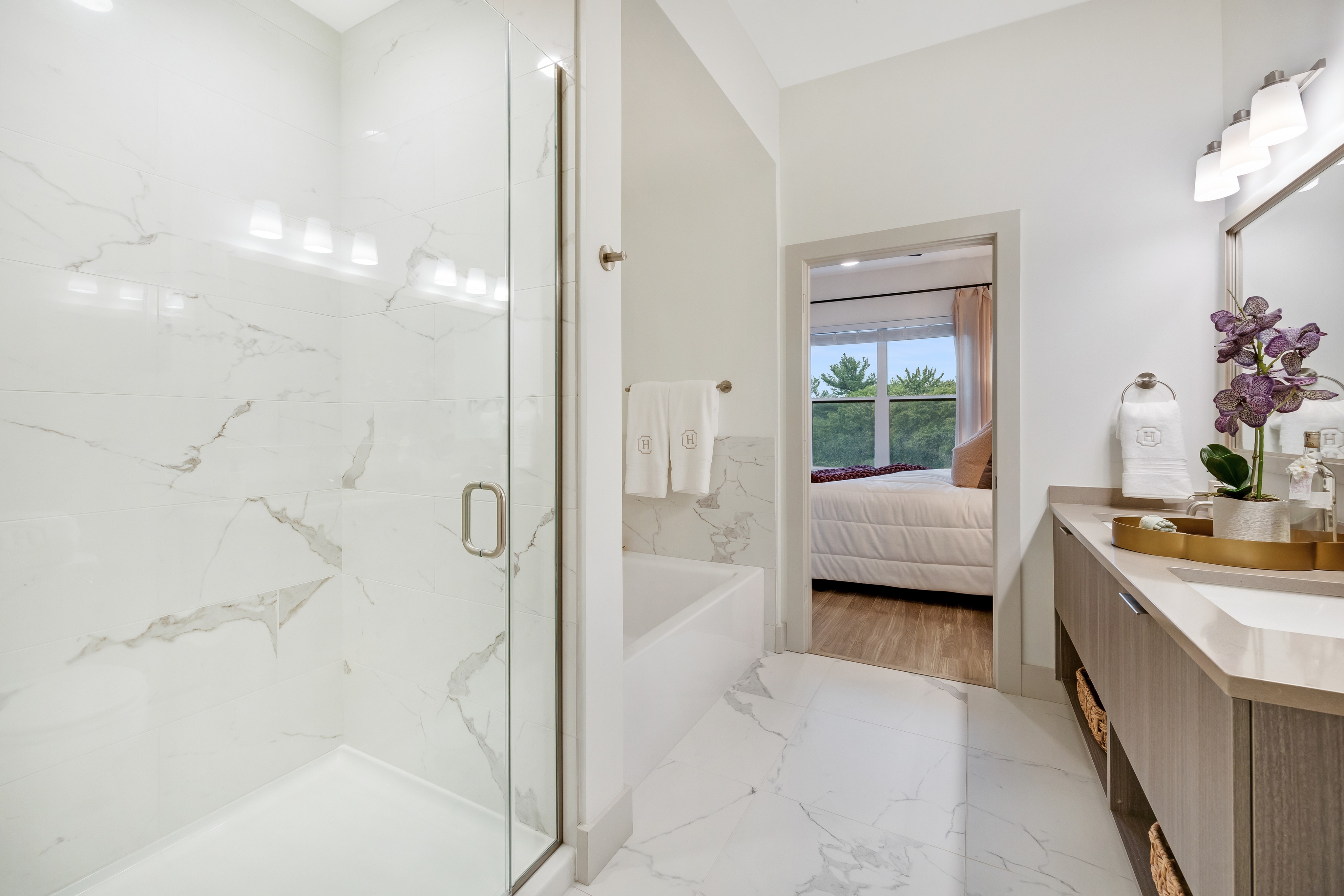 Double-vanity, walk-in showers and linen closets*